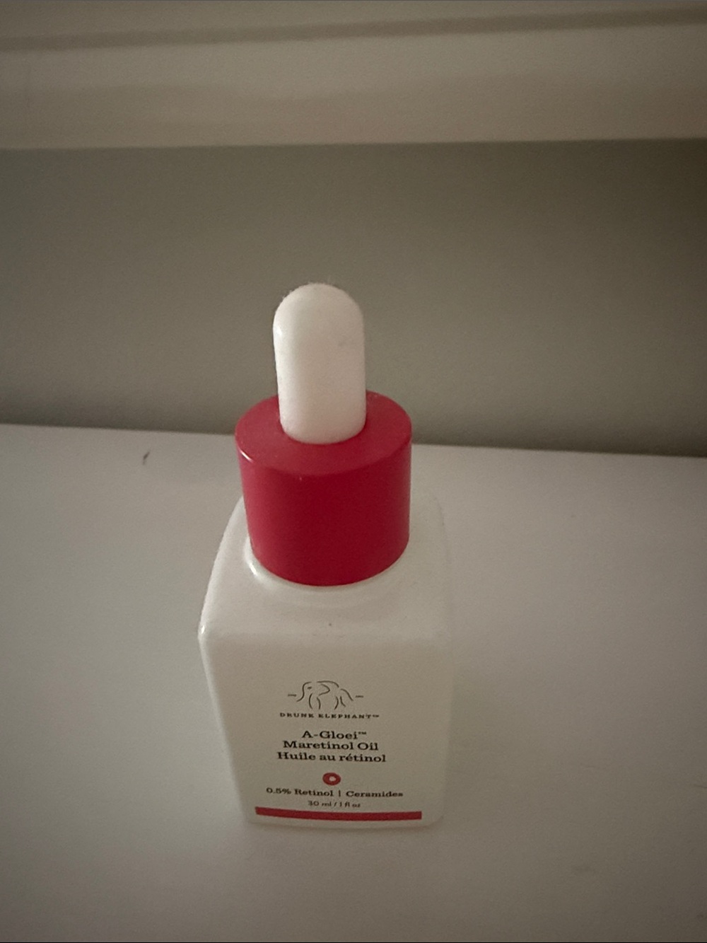 Drunk Elephant A-Gloei Marretinol Oil - White bottle with Red cap